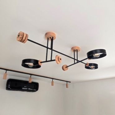 Long chandelier DIAMOND-3 with turned details and ring rotation function